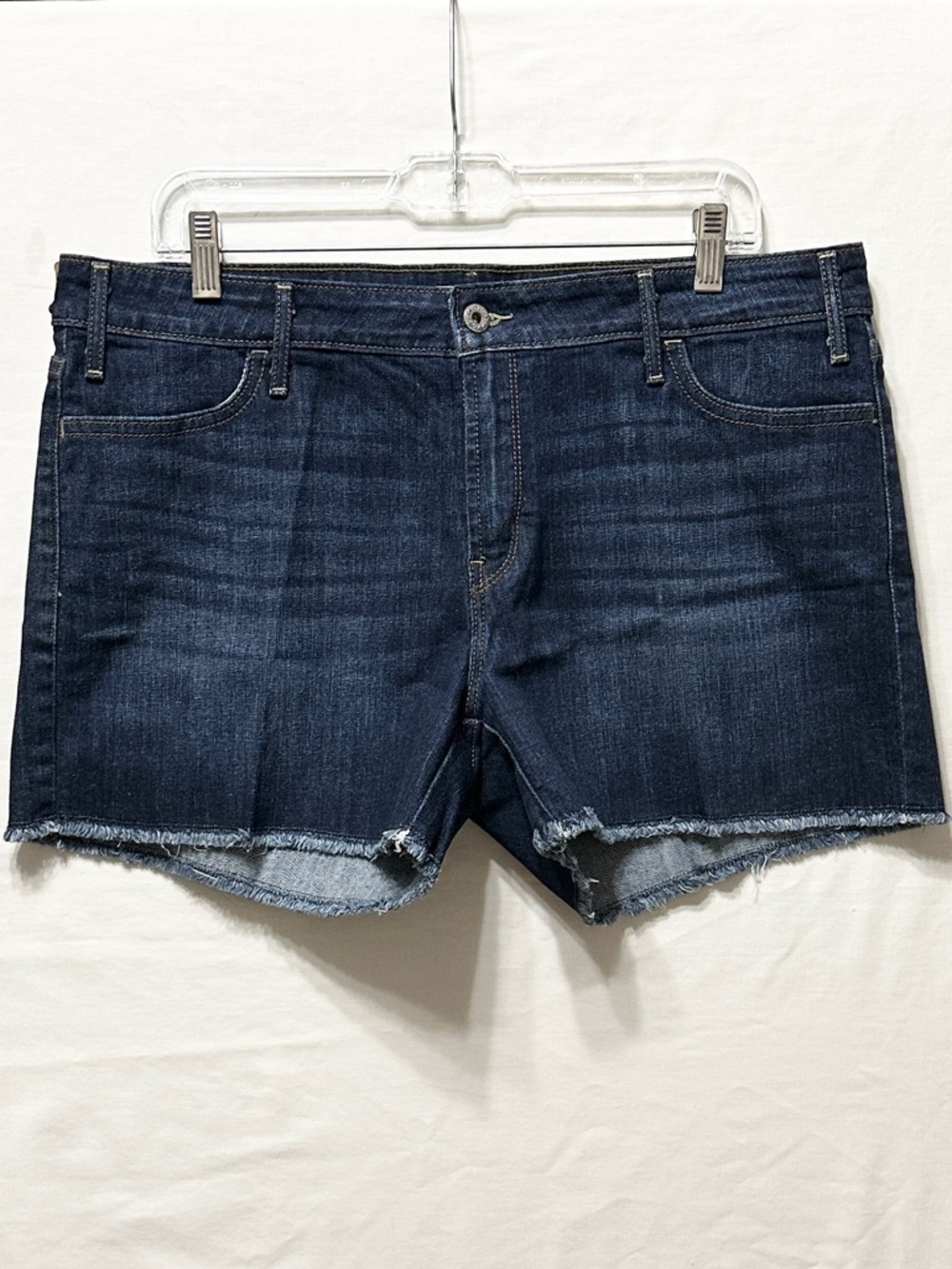 Levi's Women’s Dark Blue Stretch Denim Cutoffs Shorts with Frayed Raw Hem - 16